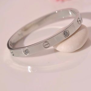 Silver Tone Bangle Bracelet Love Design Zirconia Stainless Steel Non-Tarnish